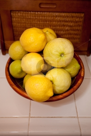 To use this stock image in your creative project, please select the size you need over to the right and click the "Add to Cart" button.
Your downloaded image will come with the Cutcaster watermark removed so don’t worry about the watermark you see on this page. Lemons stock photo, The lemon is the common name for Citrus limon. The reproductive tissue surrounds the seed of the angiosperm lemon tree. by Mariusz Jurgielewicz