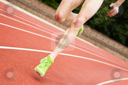 To use this stock image in your creative project, please select the size you need over to the right and click the "Add to Cart" button.
Your downloaded image will come with the Cutcaster watermark removed so don’t worry about the watermark you see on this page. Oval running stock photo, Legs and shoes of a long distance runner on an oval track by Corepics VOF