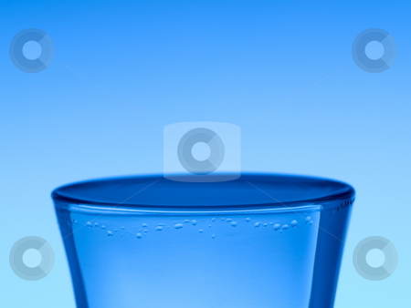 To use this stock image in your creative project, please select the size you need over to the right and click the "Add to Cart" button.
Your downloaded image will come with the Cutcaster watermark removed so don’t worry about the watermark you see on this page. Shot of vodka stock photo, A shot of vodka on blue background. by Ignacio Gonzalez Prado