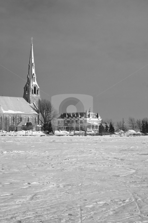 To use this stock image in your creative project, please select the size you need over to the right and click the "Add to Cart" button.
Your downloaded image will come with the Cutcaster watermark removed so don’t worry about the watermark you see on this page. Church by the lake stock photo, Winter landscape of a church by the lake by Yann Poirier