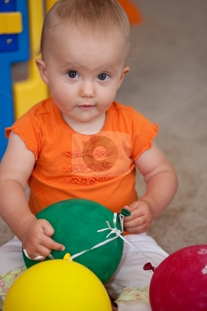 To use this stock image in your creative project, please select the size you need over to the right and click the "Add to Cart" button.
Your downloaded image will come with the Cutcaster watermark removed so don’t worry about the watermark you see on this page. Playing on the floor stock photo, Cute Caucasian baby girl playing on a floor. by Mariusz Jurgielewicz