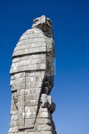 To use this stock image in your creative project, please select the size you need over to the right and click the "Add to Cart" button.
Your downloaded image will come with the Cutcaster watermark removed so don’t worry about the watermark you see on this page. Eagle statue stock photo, A statue of an eagle with a blue sky background by Roberto Marinello