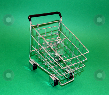 To use this stock image in your creative project, please select the size you need over to the right and click the "Add to Cart" button.
Your downloaded image will come with the Cutcaster watermark removed so don’t worry about the watermark you see on this page. Shopping cart stock photo, A little shopping cart on green for easy isolation by Cora Reed