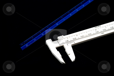 To use this stock image in your creative project, please select the size you need over to the right and click the "Add to Cart" button.
Your downloaded image will come with the Cutcaster watermark removed so don’t worry about the watermark you see on this page. Measuring instruments stock photo, Stock pictures of a ruler and a white caliper by Albert Lozano
