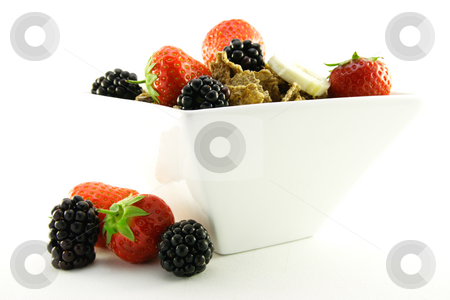 To use this stock image in your creative project, please select the size you need over to the right and click the "Add to Cart" button.
Your downloaded image will come with the Cutcaster watermark removed so don’t worry about the watermark you see on this page. Bran Flakes in a White Bowl stock photo, Crunchy delicious looking bran flakes and juicy fruit in a white bowl on a white background by Keith Wilson