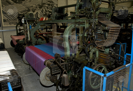 To use this stock image in your creative project, please select the size you need over to the right and click the "Add to Cart" button.
Your downloaded image will come with the Cutcaster watermark removed so don’t worry about the watermark you see on this page. Very old loom stock photo, The cotton on the big loom to make textile by Chris Willemsen