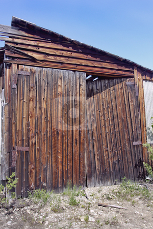 To use this stock image in your creative project, please select the size you need over to the right and click the "Add to Cart" button.
Your downloaded image will come with the Cutcaster watermark removed so don’t worry about the watermark you see on this page. Old Barn Doors stock photo, Old Barn Doors by Sharron Schiefelbein