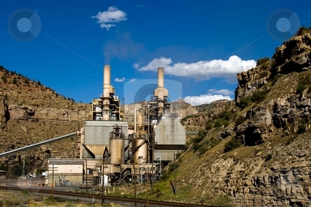 To use this stock image in your creative project, please select the size you need over to the right and click the "Add to Cart" button.
Your downloaded image will come with the Cutcaster watermark removed so don’t worry about the watermark you see on this page. Coal Power stock photo, A small coal fired power plant in a canyon. by Andrew Orlemann