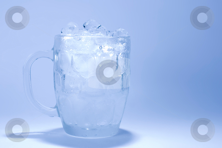 To use this stock image in your creative project, please select the size you need over to the right and click the "Add to Cart" button.
Your downloaded image will come with the Cutcaster watermark removed so don’t worry about the watermark you see on this page. Ice cube in glass stock photo, Ice cube in glass with blue background by Lawren