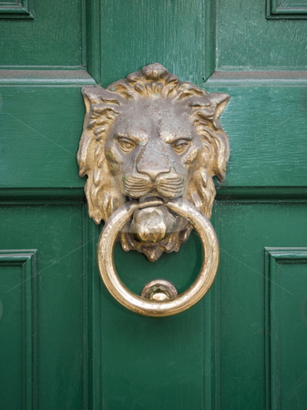 To use this stock image in your creative project, please select the size you need over to the right and click the "Add to Cart" button.
Your downloaded image will come with the Cutcaster watermark removed so don’t worry about the watermark you see on this page. Lions head on green door stock photo, A brass lions head on a glossy green door by Mike Smith