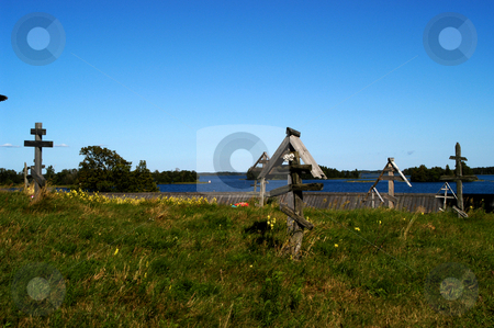To use this stock image in your creative project, please select the size you need over to the right and click the "Add to Cart" button.
Your downloaded image will come with the Cutcaster watermark removed so don’t worry about the watermark you see on this page. Kizhi Cemetery stock photo, Russia, Karelia Republic, Lake Onega, Kizhi Island, Kizhi Open Air Museum, Cemetery by David Ryan