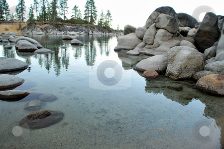 To use this stock image in your creative project, please select the size you need over to the right and click the "Add to Cart" button.
Your downloaded image will come with the Cutcaster watermark removed so don’t worry about the watermark you see on this page. Lake Tahoe, Sand Harbor stock photo, Small bay at Lake Tahoe with rounded granite boulders in the crystal clear water by Lynn Bendickson