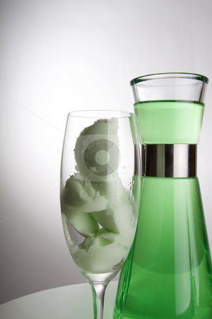 To use this stock image in your creative project, please select the size you need over to the right and click the "Add to Cart" button.
Your downloaded image will come with the Cutcaster watermark removed so don’t worry about the watermark you see on this page. Green ice cream stock photo, Bright green ice cream in a tall champagne glass and a can in the background by Daniel Kafer