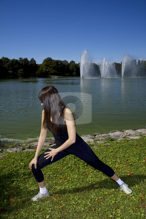 To use this stock image in your creative project, please select the size you need over to the right and click the "Add to Cart" button.
Your downloaded image will come with the Cutcaster watermark removed so don’t worry about the watermark you see on this page. Woman stretching in the park stock photo, Latina is working out in the park stretching before a run by Daniel Kafer