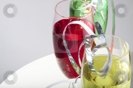 To use this stock image in your creative project, please select the size you need over to the right and click the "Add to Cart" button.
Your downloaded image will come with the Cutcaster watermark removed so don’t worry about the watermark you see on this page. Colorful drinks with streamers stock photo, Colorful cocktails for a party decorated with silver streamers by Daniel Kafer