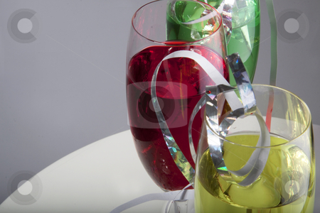 To use this stock image in your creative project, please select the size you need over to the right and click the "Add to Cart" button.
Your downloaded image will come with the Cutcaster watermark removed so don’t worry about the watermark you see on this page. Colorful drinks with streamers stock photo, Colorful cocktails for a party decorated with silver streamers by Daniel Kafer