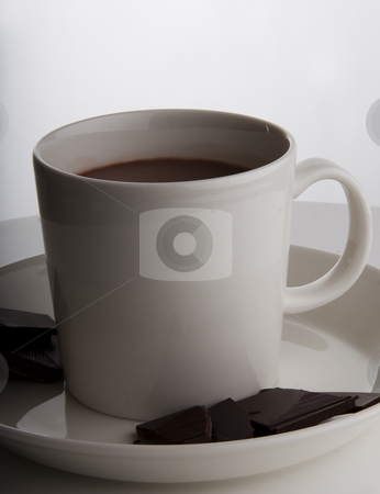 To use this stock image in your creative project, please select the size you need over to the right and click the "Add to Cart" button.
Your downloaded image will come with the Cutcaster watermark removed so don’t worry about the watermark you see on this page. Hot chocolate in designer cup stock photo, Hot chocolate in a white cup with peices of dark deluxe chocolate on the side by Daniel Kafer