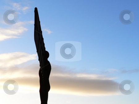 To use this stock image in your creative project, please select the size you need over to the right and click the "Add to Cart" button.
Your downloaded image will come with the Cutcaster watermark removed so don’t worry about the watermark you see on this page. Angel of the North stock photo, Angel of the North Landmark of Gateshead Newcastle side view by Laurent Dambies