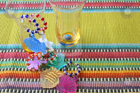 To use this stock image in your creative project, please select the size you need over to the right and click the "Add to Cart" button.
Your downloaded image will come with the Cutcaster watermark removed so don’t worry about the watermark you see on this page. Shot Glasses stock photo, Shot Glasses with different colored and beaded stem decorations by Vanessa Van Rensburg