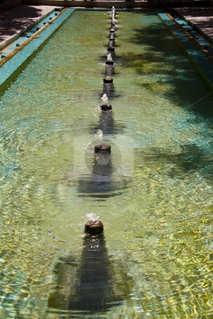 To use this stock image in your creative project, please select the size you need over to the right and click the "Add to Cart" button.
Your downloaded image will come with the Cutcaster watermark removed so don’t worry about the watermark you see on this page. Fountain in Fin Garden stock photo, Small fountain in Fin Garden - Kashan in Iran by Tomasz Parys