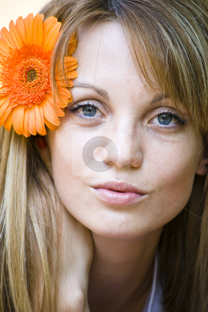 To use this stock image in your creative project, please select the size you need over to the right and click the "Add to Cart" button.
Your downloaded image will come with the Cutcaster watermark removed so don’t worry about the watermark you see on this page. Portrait of beautiful young woman stock photo, Portrait of beautiful young blond woman with gerbera flower by Desislava Dimitrova