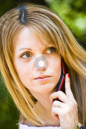 To use this stock image in your creative project, please select the size you need over to the right and click the "Add to Cart" button.
Your downloaded image will come with the Cutcaster watermark removed so don’t worry about the watermark you see on this page. Beautiful young woman talking on phone stock photo, Beautiful young model talking on phone by Desislava Dimitrova
