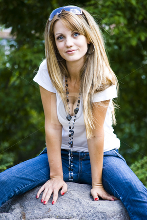 To use this stock image in your creative project, please select the size you need over to the right and click the "Add to Cart" button.
Your downloaded image will come with the Cutcaster watermark removed so don’t worry about the watermark you see on this page. Beautiful young woman posing stock photo, Beautiful young model posing outdoor by Desislava Dimitrova