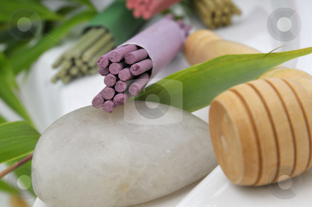 To use this stock image in your creative project, please select the size you need over to the right and click the "Add to Cart" button.
Your downloaded image will come with the Cutcaster watermark removed so don’t worry about the watermark you see on this page. Spa stock photo, Massage roll, hot stone and joss sticks by Carmen Steiner