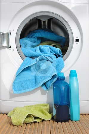 To use this stock image in your creative project, please select the size you need over to the right and click the "Add to Cart" button.
Your downloaded image will come with the Cutcaster watermark removed so don’t worry about the watermark you see on this page. Washing towels stock photo, Open washing machine with towels by Carmen Steiner