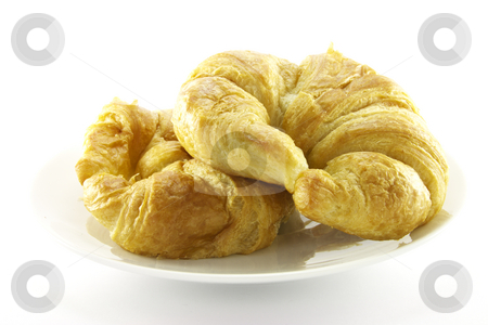 To use this stock image in your creative project, please select the size you need over to the right and click the "Add to Cart" button.
Your downloaded image will come with the Cutcaster watermark removed so don’t worry about the watermark you see on this page. Two Croissants on a White Plate stock photo, Two golden flakey delicious baked croissants on a white plate with a white background by Keith Wilson