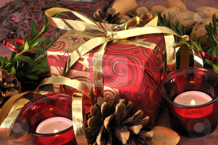 To use this stock image in your creative project, please select the size you need over to the right and click the "Add to Cart" button.
Your downloaded image will come with the Cutcaster watermark removed so don’t worry about the watermark you see on this page. Xmas stock photo, Christmas gift on a festive table by Carmen Steiner