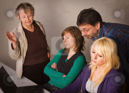 To use this stock image in your creative project, please select the size you need over to the right and click the "Add to Cart" button.
Your downloaded image will come with the Cutcaster watermark removed so don’t worry about the watermark you see on this page. Difficult task stock photo, Two teenager girls doing their homework together with their parents by Mikhail Lavrenov