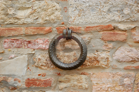 To use this stock image in your creative project, please select the size you need over to the right and click the "Add to Cart" button.
Your downloaded image will come with the Cutcaster watermark removed so don’t worry about the watermark you see on this page. Iron ring stock photo, Closeup of an iron ring on a wall by ALESSANDRO TERMIGNONE