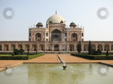 To use this stock image in your creative project, please select the size you need over to the right and click the "Add to Cart" button.
Your downloaded image will come with the Cutcaster watermark removed so don’t worry about the watermark you see on this page. Jama Masjid Mosque in Delhi India stock photo, The massive salmon colored Jantar Mantar, was built in the year 1725 by Maharaja Jai Singh II of Jaipur. He was a keen astronomer and this observatory is dominated by a huge sundial better known as the Prince of Dials. The other instruments define the course of heavenly bodies and predict eclipses. by Sharron Schiefelbein