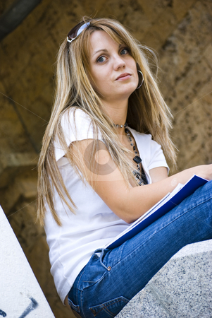 To use this stock image in your creative project, please select the size you need over to the right and click the "Add to Cart" button.
Your downloaded image will come with the Cutcaster watermark removed so don’t worry about the watermark you see on this page. Beautiful young woman reading book stock photo, Beautiful young woman reading book outdoor by Desislava Dimitrova