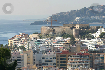 To use this stock image in your creative project, please select the size you need over to the right and click the "Add to Cart" button.
Your downloaded image will come with the Cutcaster watermark removed so don’t worry about the watermark you see on this page. Castle Zoom stock photo, A large panoramic shot showing sea, rock, mountains, a castle and a Spanish town. You can zoom in quite a long way with this image by Darren Booth