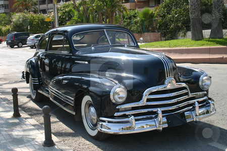 To use this stock image in your creative project, please select the size you need over to the right and click the "Add to Cart" button.
Your downloaded image will come with the Cutcaster watermark removed so don’t worry about the watermark you see on this page. 1947 ink blue family car stock photo, 1947 ink blue family car. Front 3/4 profile by Darren Booth