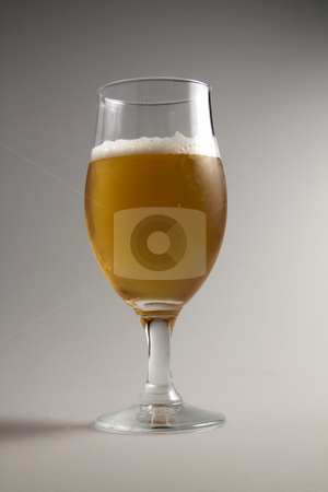 To use this stock image in your creative project, please select the size you need over to the right and click the "Add to Cart" button.
Your downloaded image will come with the Cutcaster watermark removed so don’t worry about the watermark you see on this page. Beer stock photo, Close up of a glass of lager beer by Fabio Alcini