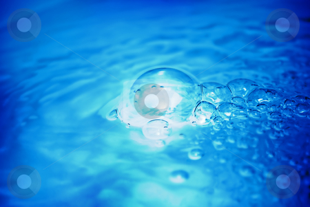 To use this stock image in your creative project, please select the size you need over to the right and click the "Add to Cart" button.
Your downloaded image will come with the Cutcaster watermark removed so don’t worry about the watermark you see on this page. Blue Bubbles stock photo, Beautiful blue bubbles floating on the water by Martin Cuevas