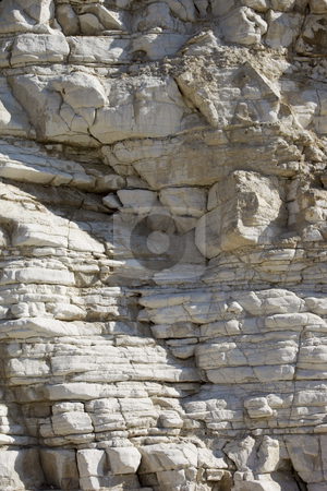 To use this stock image in your creative project, please select the size you need over to the right and click the "Add to Cart" button.
Your downloaded image will come with the Cutcaster watermark removed so don’t worry about the watermark you see on this page. Limestone rock formation stock photo, A limestone rock formation on the coast in summer by Mike Smith