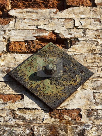 To use this stock image in your creative project, please select the size you need over to the right and click the "Add to Cart" button.
Your downloaded image will come with the Cutcaster watermark removed so don’t worry about the watermark you see on this page. Iron tie bar stock photo, Weathered iron tie bar on crumbling old brick wall by Mike Smith