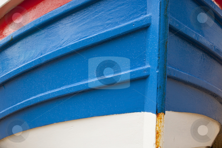 To use this stock image in your creative project, please select the size you need over to the right and click the "Add to Cart" button.
Your downloaded image will come with the Cutcaster watermark removed so don’t worry about the watermark you see on this page. Prow of a filey coble stock photo, A close up of the prow of a brightly painted traditional small fishing boat by Mike Smith