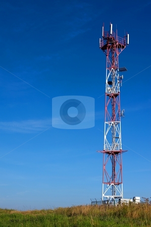 To use this stock image in your creative project, please select the size you need over to the right and click the "Add to Cart" button.
Your downloaded image will come with the Cutcaster watermark removed so don’t worry about the watermark you see on this page. Telecommunication tower stock photo, Telecommunication tower on a meadow in sunny day with blue sky by Juraj Kovacik