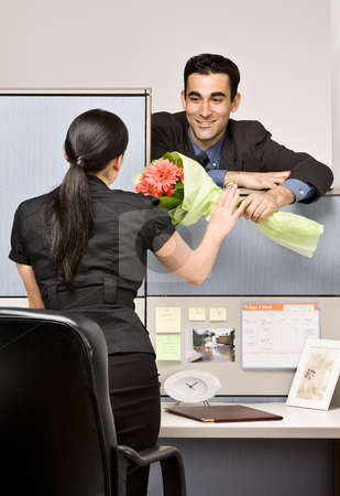 To use this stock image in your creative project, please select the size you need over to the right and click the "Add to Cart" button.
Your downloaded image will come with the Cutcaster watermark removed so don’t worry about the watermark you see on this page. Businessman giving co-worker flowers stock photo, Businessman giving co-worker flowers by Jonathan Ross