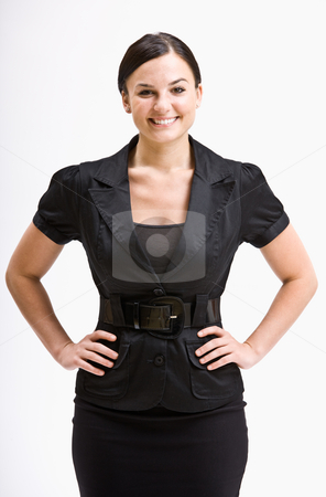 To use this stock image in your creative project, please select the size you need over to the right and click the "Add to Cart" button.
Your downloaded image will come with the Cutcaster watermark removed so don’t worry about the watermark you see on this page. Smiling businesswoman with hands on hips stock photo, Smiling businesswoman with hands on hips by Jonathan Ross