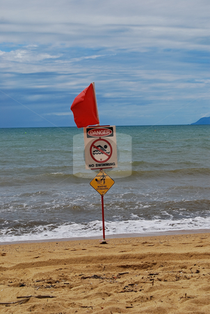 To use this stock image in your creative project, please select the size you need over to the right and click the "Add to Cart" button.
Your downloaded image will come with the Cutcaster watermark removed so don’t worry about the watermark you see on this page. No swimming here stock photo, Australian no swimming flag on the beach by Emma White