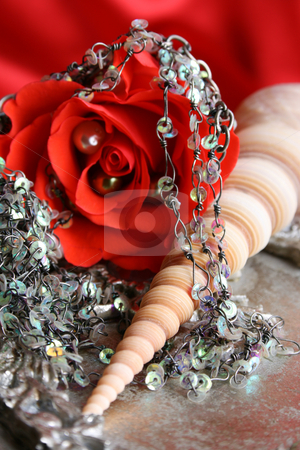 To use this stock image in your creative project, please select the size you need over to the right and click the "Add to Cart" button.
Your downloaded image will come with the Cutcaster watermark removed so don’t worry about the watermark you see on this page. Red Rose Pearl stock photo, Red rose with fine jewelery on a seashell by Vanessa Van Rensburg