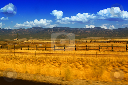 To use this stock image in your creative project, please select the size you need over to the right and click the "Add to Cart" button.
Your downloaded image will come with the Cutcaster watermark removed so don’t worry about the watermark you see on this page. Drive by the Mountains stock photo, Drive by shooting in the Mountains by Mehmet Dilsiz