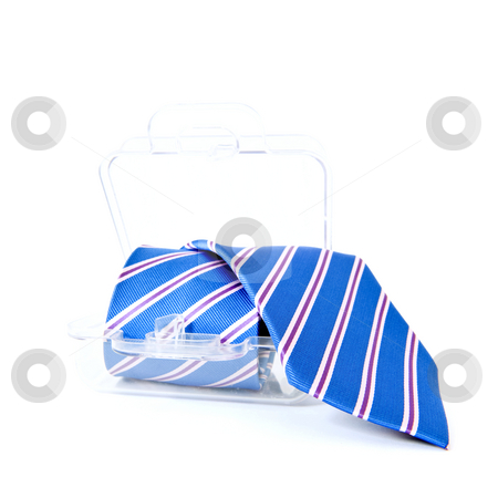 To use this stock image in your creative project, please select the size you need over to the right and click the "Add to Cart" button.
Your downloaded image will come with the Cutcaster watermark removed so don’t worry about the watermark you see on this page. Necktie gift pack stock photo, Blue striped necktie in a transparent plastic gift pack by Corepics VOF
