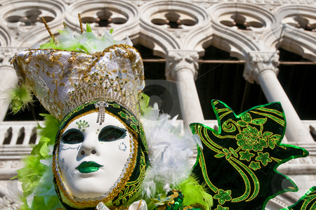 To use this stock image in your creative project, please select the size you need over to the right and click the "Add to Cart" button.
Your downloaded image will come with the Cutcaster watermark removed so don’t worry about the watermark you see on this page. Venice Carnival 2009 stock photo, With Il Palazzo Ducale as backdrop, the masked participants walk along the Riva degli Schiavoni. by Anibal Trejo